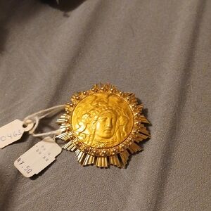 Gold Sunburst Medallion Brooch